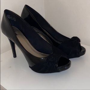 Black open toe heels with knot design